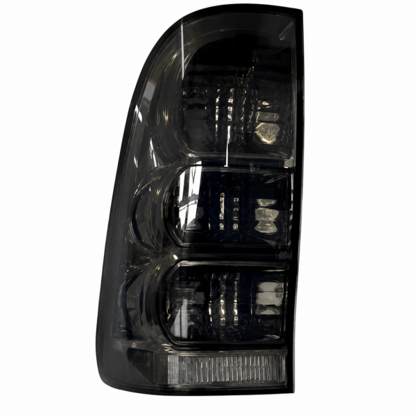 FARO TRASERO HILUX 05/11 TODO FUME IZQUIERDO